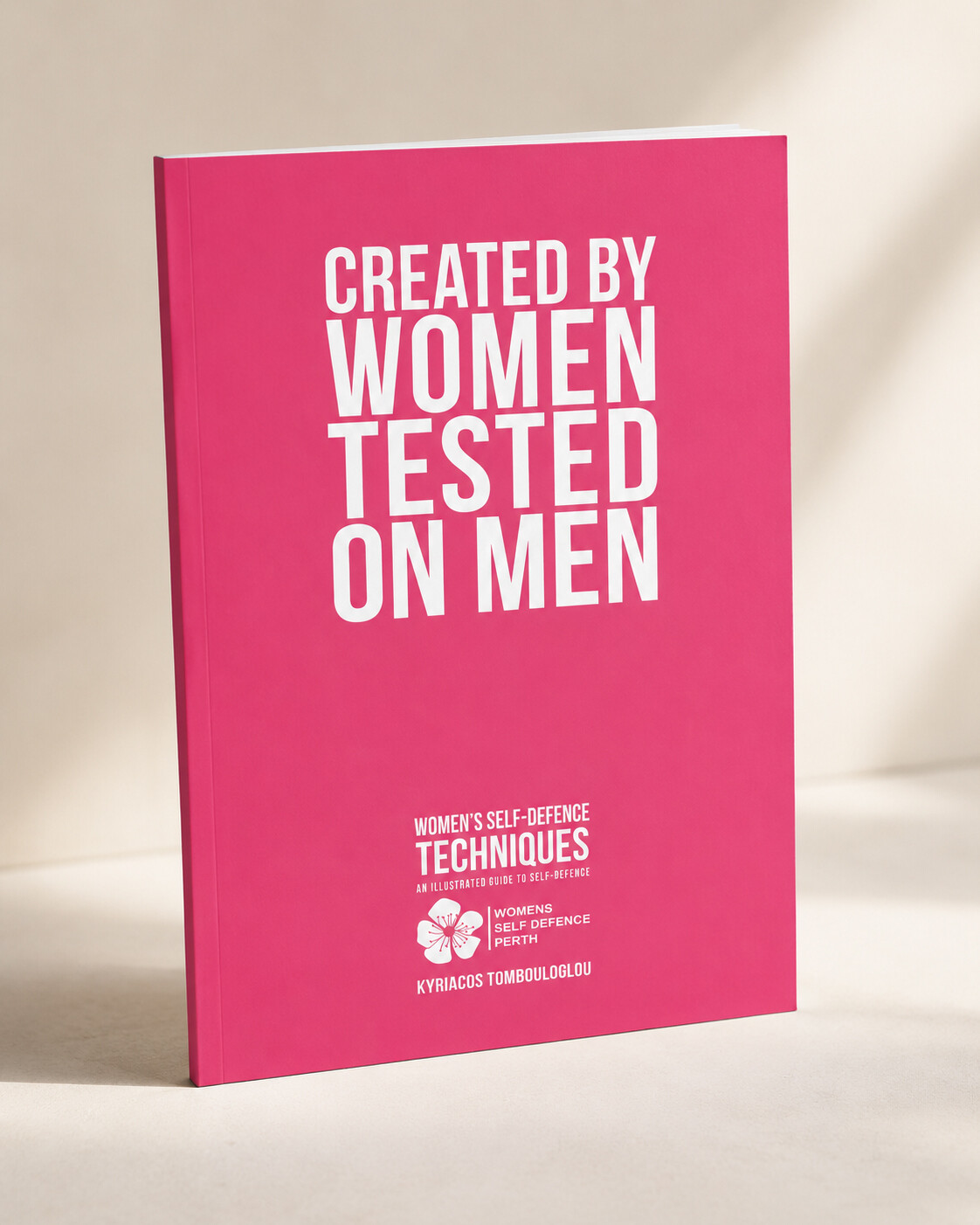 A5 paperback copy of Created By Women Tested On Men